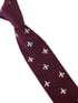 maroon knitted tie with white embroidered fleur de lis lys design